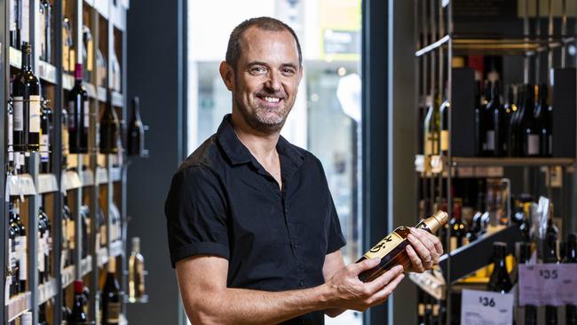 Vintage Cellars business category manager Ed Scully holding the $1m bottle of Japanese whisky Yamazaki 55.