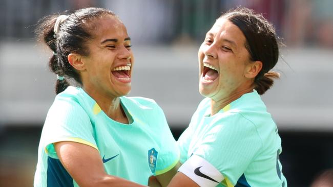 PERTH, AUSTRALIA - OCTOBER 29: Mary Fowler of the Matildas and Sam Kerr of the Matildas celebrate a goal during the AFC Women's Asian Olympic Qualifier match between Philippines and Australia Matildas at Optus Stadium on October 29, 2023 in Perth, Australia. (Photo by James Worsfold/Getty Images)