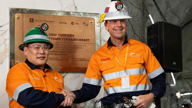 Mongolian Prime Minister Oyun-Erdene Luvsannamsrai and Rio chief Jakob Stausholm celebrate production commencement at the Oyu Tolgoi copper-gold mine. Picture: Bloomberg