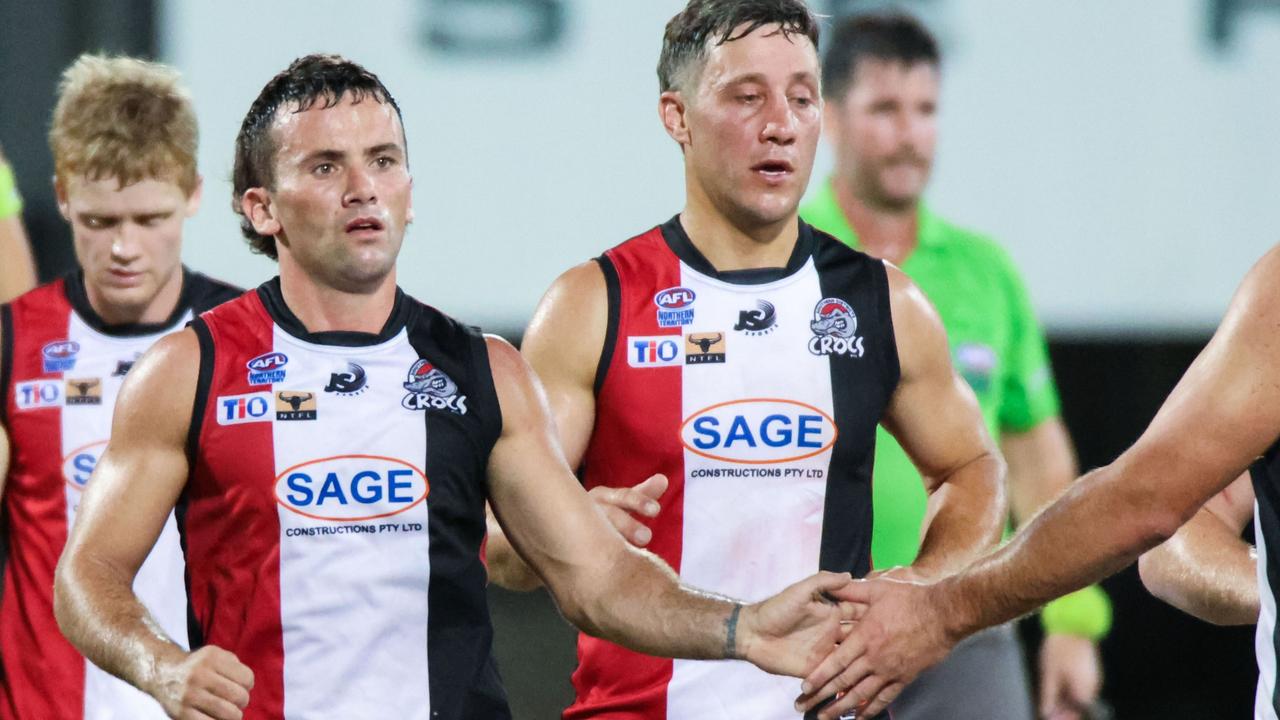 Dean Staunton (left) has been charged with rough conduct against PINT. Picture: Celina Whan / AFLNT Media.