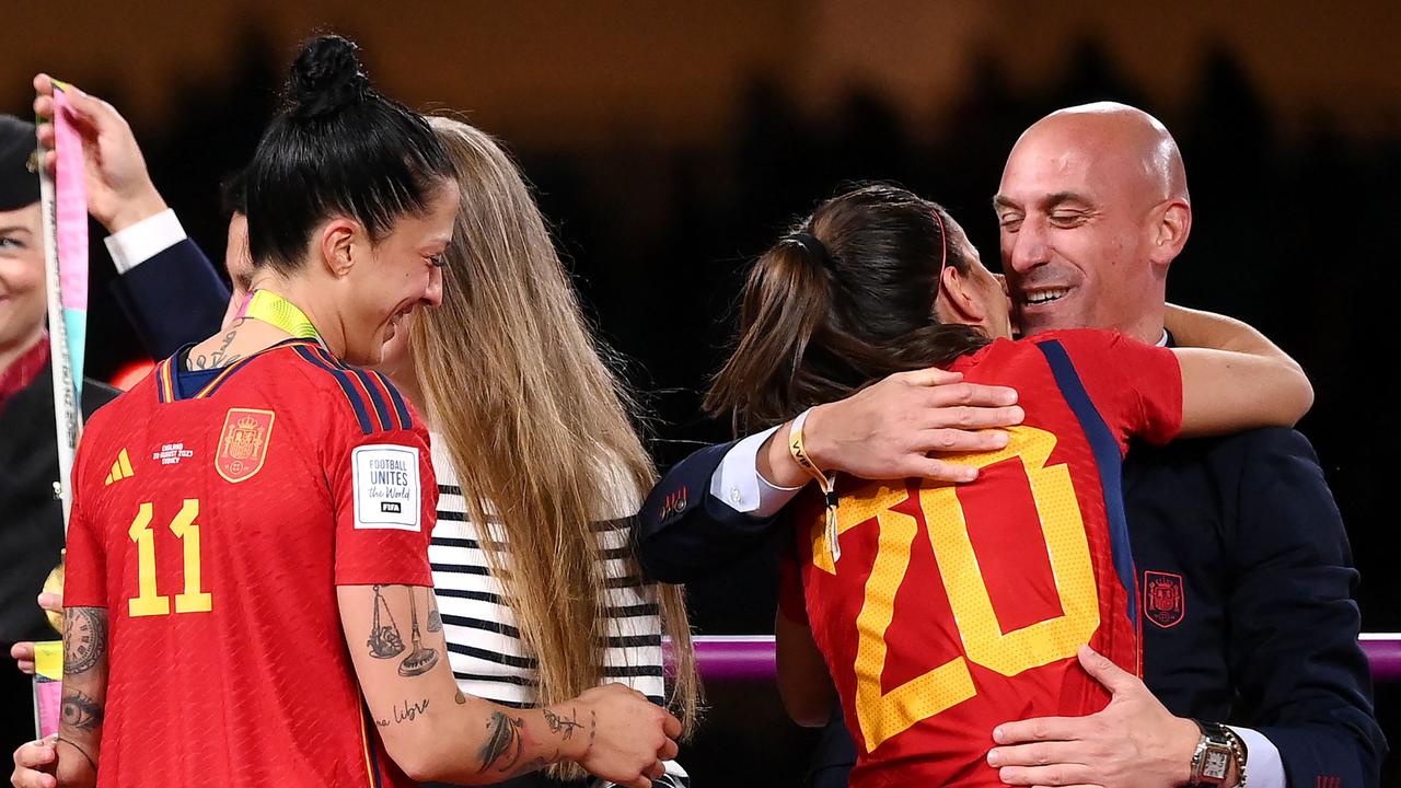 Spain's defender #20 Rocio Galvez is congratuled by President of the Royal Spanish Football Federation Luis Rubiales (R). (Photo by FRANCK FIFE / AFP)