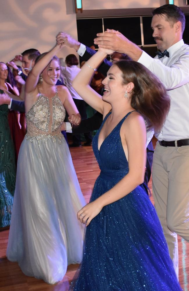 Students and parents hit the dance floor at the Suncoast Christian College formal at The Events Centre, Caloundra.