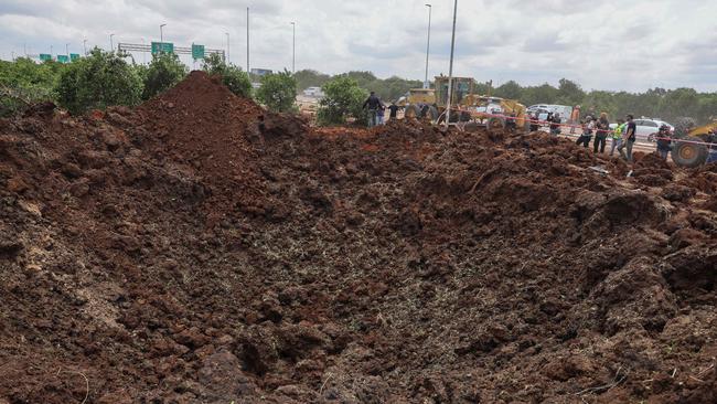 A crater caused by the missile. Picture: AFP