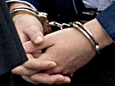 *FILE PIX* NCA NewsWire Photos: Editorial generic stock photo of person in handcuffs. Picture: NCA NewsWire