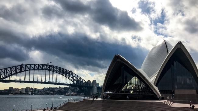 Patchy clouds over the Sydney Harbour Bridge and Opera House. Picture: Nicholas Eagar