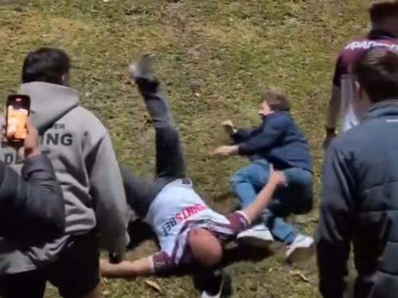 Screenshot posted on the Instagram page of @creaturesofmanly showing NRL fans at Brookvale oval participating in an impromptu run it straight. https://www.instagram.com/p/DKXz-_mS1DM/,