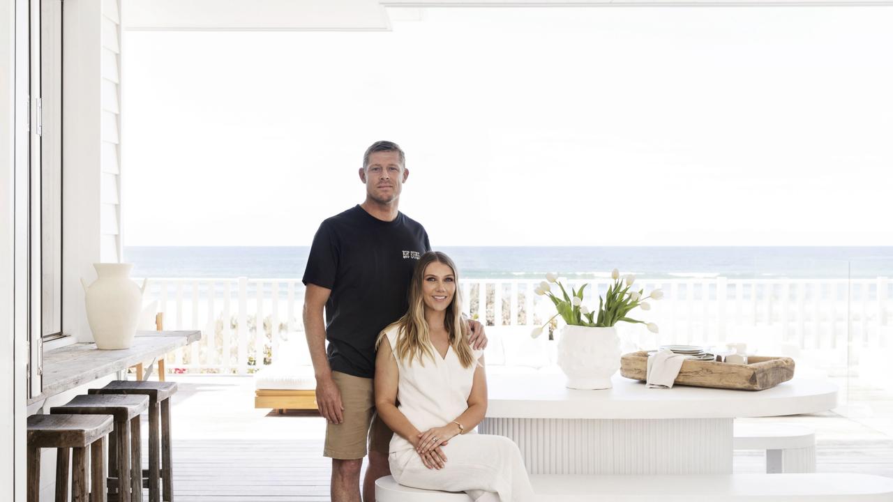 Fanning and partner Breanna Randall on the beachfront entertaining deck