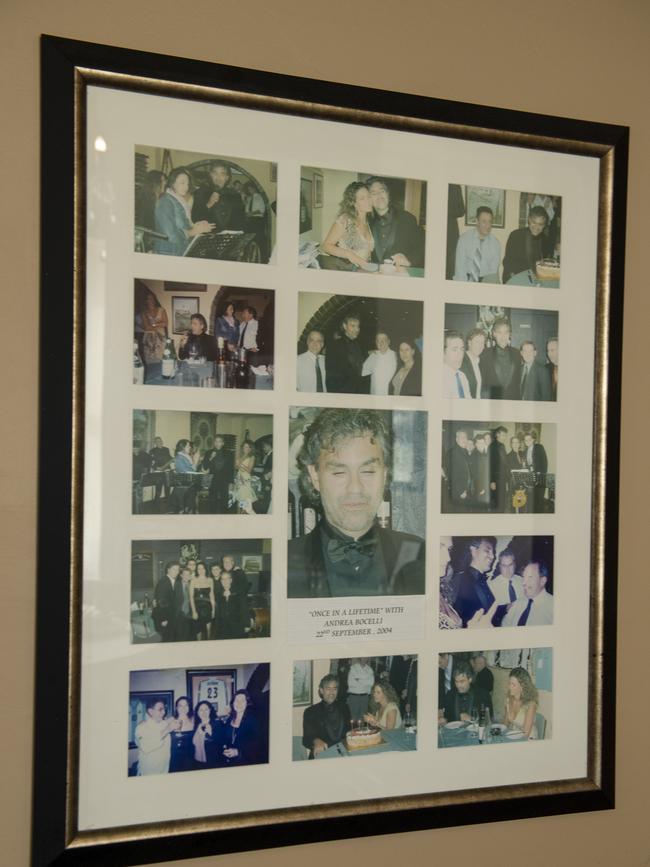 Andrea Bocelli photos framed at Enzo's. Picture Mark Brake