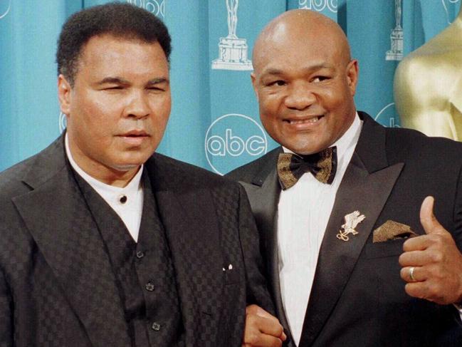 Former heavyweight boxers Muhammad Ali (L) & George Foreman on stage during Academy Awards ceremony 24/03/97. Boxing