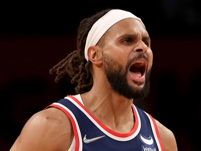 NEW YORK, NEW YORK - DECEMBER 03:  Patty Mills #8 of the Brooklyn Nets celebrates his shot late in the fourth quarter against the Minnesota Timberwolves at Barclays Center on December 03, 2021 in the Brooklyn borough of New York City. The Brooklyn Nets defeated the Minnesota Timberwolves 110-105. NOTE TO USER: User expressly acknowledges and agrees that, by downloading and or using this photograph, User is consenting to the terms and conditions of the Getty Images License Agreement. (Photo by Elsa/Getty Images)