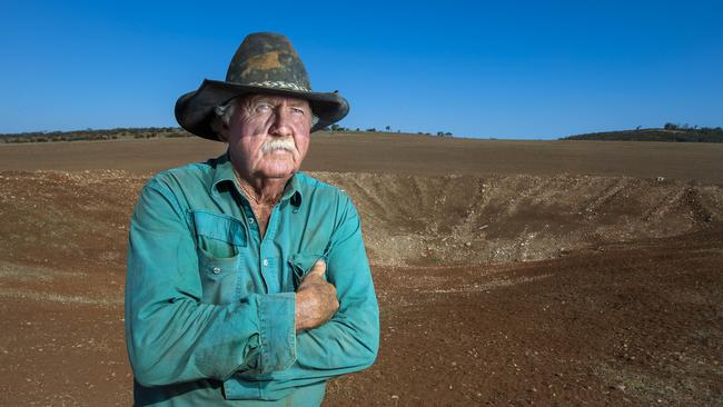 Ben Carn, farmer and station owner, at one of his graded dry dams on his Quorn property. Picture: Mark Brake