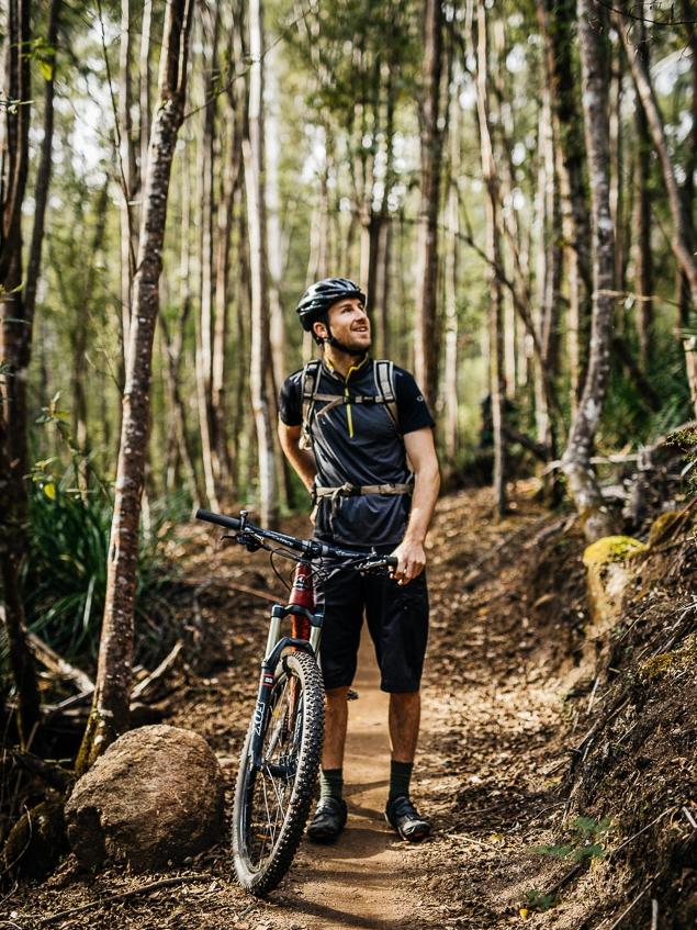 A rider takes a breather to check out the spectacular view on the Blue Derby trails ride.