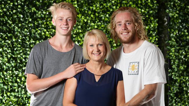 Zach and Cam Guthrie with their mum, Suzanne Guthrie Suzanne has had breast cancer and speaks about her experience ahead of a GFC fundraiser. Picture: Peter Ristevski