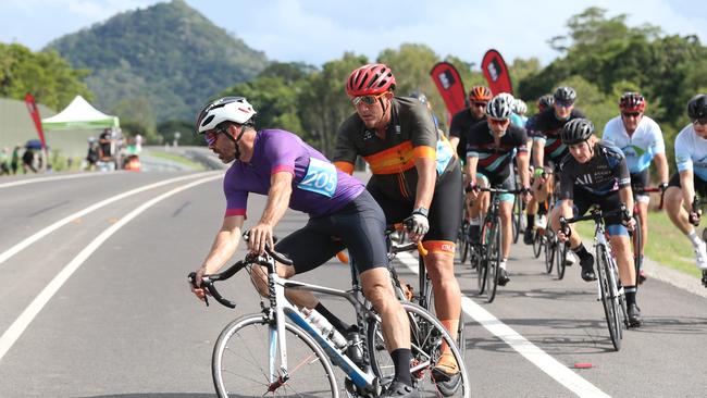 Keith Feron competes in the cycle race at the Smithfield Bypass community party complete with running and bike races, military and vintage car collections and food and drink stalls. Picture: Brendan Radke