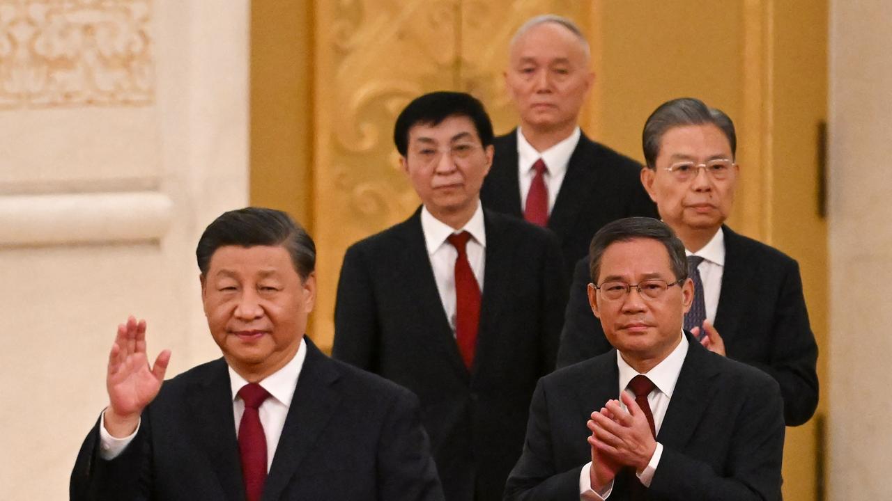 All these men look older than 35 to me, but are enjoying the top jobs in the country. Pictured: China's President Xi Jinping (L) walks with members of the Chinese Communist Party. Picture: Noel Celis / AFP