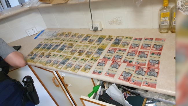 Police seized some $30,000 in cash during raids on OMG on the Sunshine Coast.