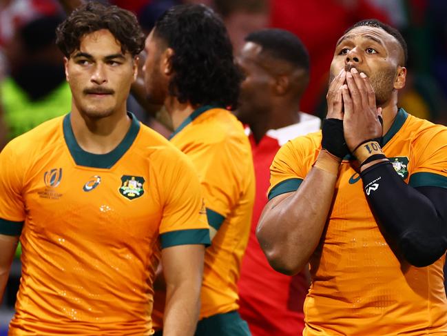 LYON, FRANCE - SEPTEMBER 24: Jordan Petaia and Samu Kerevi of Australia look dejected at full-time following the Rugby World Cup France 2023 match between Wales and Australia at Parc Olympique on September 24, 2023 in Lyon, France. (Photo by Chris Hyde/Getty Images)