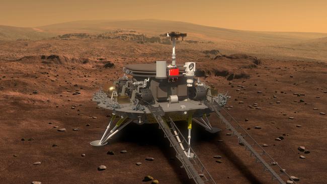 This artist's rendering shows a concept design for a Mars rover and lander. According to Chinese state media, China plans to launch an orbiter that will deploy a lander and rover onto the surface of Mars in 2020. Picture: Xinhua via AP