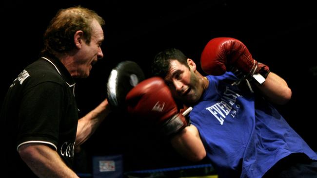 Joe Calzaghe spars with his father and trainer Enzo Calzaghe. Picture: Getty Images