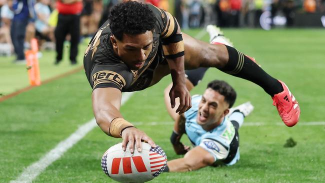 Paul Alamoti scores against the Sharks. Picture: Getty Images