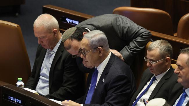 Benjamin Netanyahu (C) attends a session at the Knesset, amid a months-long wave of protests against the government. Picture: AFP.