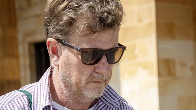 ADELAIDE, AUSTRALIA - NewsWire Photos OCTOBER 3, 2023: School Teacher Clayton Page outside AdelaideÃ•s Magistrate Courts accused of  grooming a child online. Picture: NCA NewsWIRE / Emma Brasier