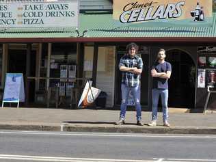 Jared Nixon, the General Store owner's son, and Andrew Baguley, owner of Clunes Cafe, are not happy about the proposed island and crossing in front of their shops. Picture: Mireille Merlet-Shaw