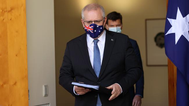 Prime Minister Scott Morrison with Angus Taylor at a press conference in Parliament House in Canberra. Picture: NCA NewsWire / Gary Ramage