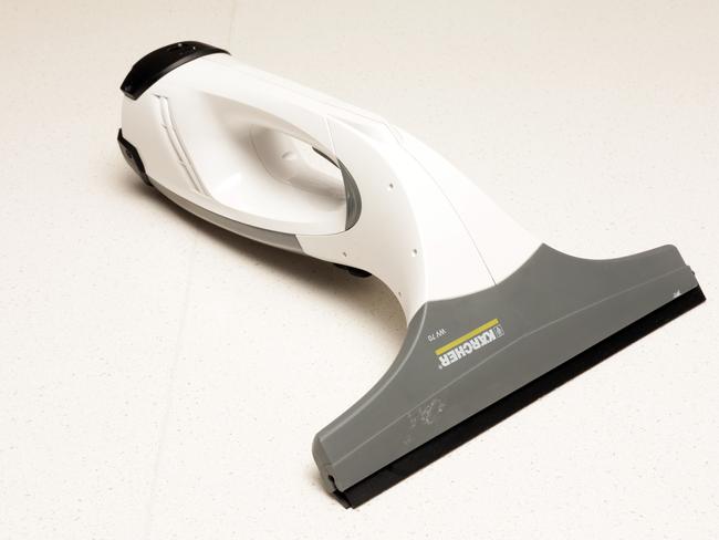 Indispensable ... rechargeable vacuum window cleaner. Picture: John Fotiadis