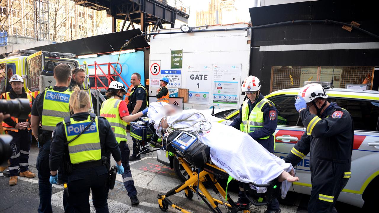 The man was removed by police and paramedics. Picture: NewsWire / Andrew Henshaw