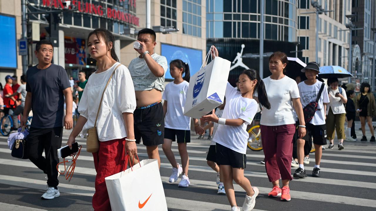 Behind China’s thin veneer it is struggling with a financial crisis. Picture: WANG Zhao / AFP