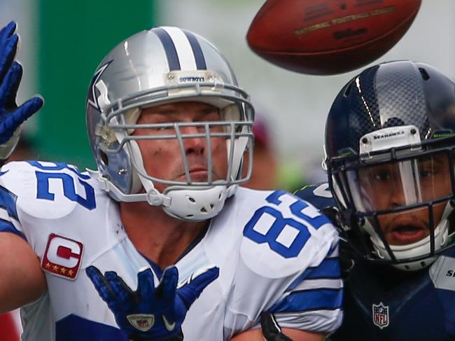 SEATTLE, WA - OCTOBER 12: Tight end Jason Witten #82 of the Dallas Cowboys misses a catch against linebacker Malcolm Smith #53 of the Seattle Seahawks at CenturyLink Field on October 12, 2014 in Seattle, Washington. (Photo by Otto Greule Jr/Getty Images)