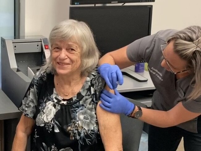 Nadine Edmunds vaccinates Carmel Clarke at Southside Medical Centre