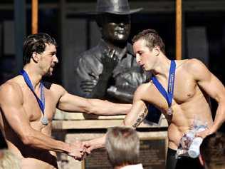 Michael Phelps congratulates Nick D’Arcy after being beaten in California yesterday. Picture: Ezra Shaw