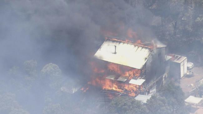 Thick smoke from the Parkerville fire blankets the area, where lives and homes were under threat. Picture: 9News