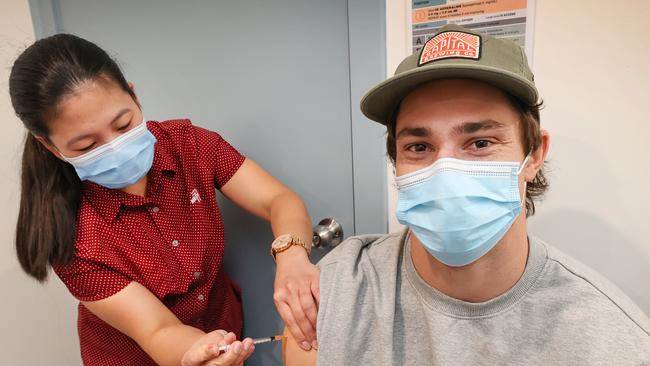 St Kilda captain Jack Steele gets vaccinated. Picture: David Caird