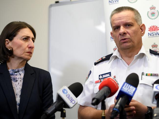 Rural Fire Service Deputy Commissioner Rob Rogers speaks to media with NSW Premier Gladys Berejiklian after touring bushfire affected areas of the Blue Mountains on Monday, December 23. Picture: AAP