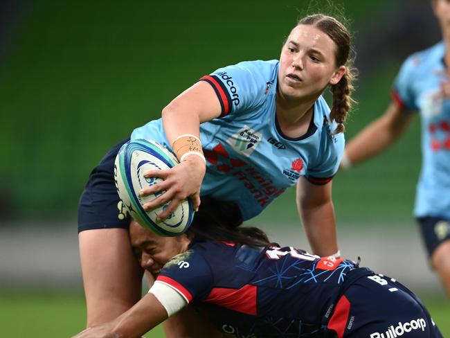 MELBOURNE, AUSTRALIA - APRIL 21: Caitlyn Halse of the Waratahs passes the ball during the Super W match between Melbourne Rebels Women and NSW Waratahs Women at AAMI Park, on April 21, 2023, in Melbourne, Australia. (Photo by Quinn Rooney/Getty Images)