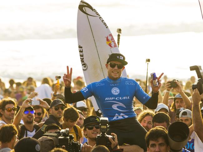 Mick Fanning of Australia celebrates his victory at the Moche Rip Curl Pro Portugal on October 20, 2014 in Peniche, Portugal. (Photo by Kirstin Scholtz/ASP via Getty Images)