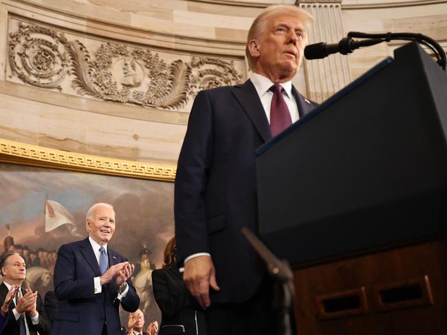 Former first lady Jill Biden, former second gentleman Doug Emhoff and former US President Joe Biden react as US President Donald Trump gives a speech during inauguration ceremonies in the Rotunda of the US Capitol on January 20, 2025 in Washington, DC. Donald Trump takes office for his second term as the 47th president of the United States. (Photo by Chip Somodevilla / POOL / AFP)