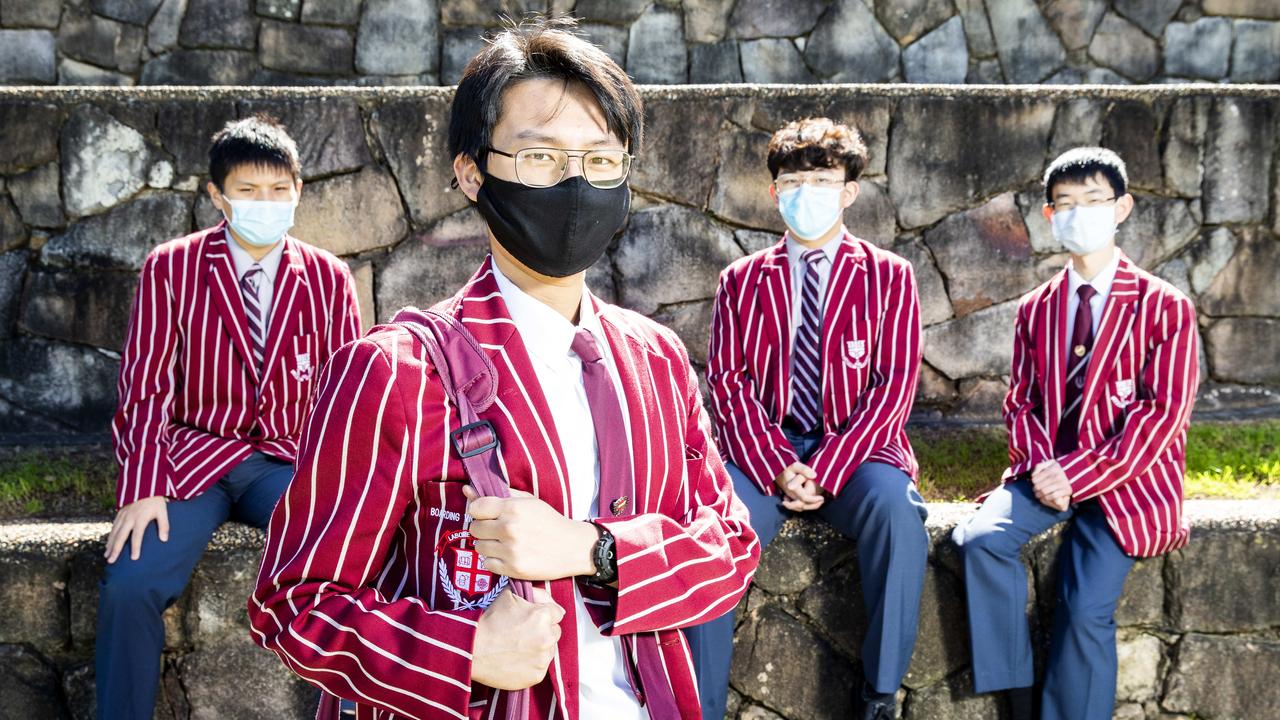 Ipswich Grammar School boarding students Harvey Li with (left to right) Louis Yang, Sunny Ma and Isaac Hou. Picture: Richard Walker