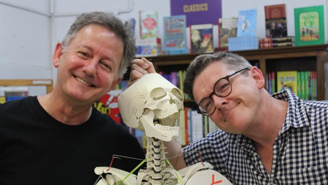 Nick Earls (left) and Terry Whidborne (right) contributed to the 700 page rib-tickler Funny Bones. Proceeds from sales will fund programs supporting children living in war zones around the world. Photo Andrea Macleod.