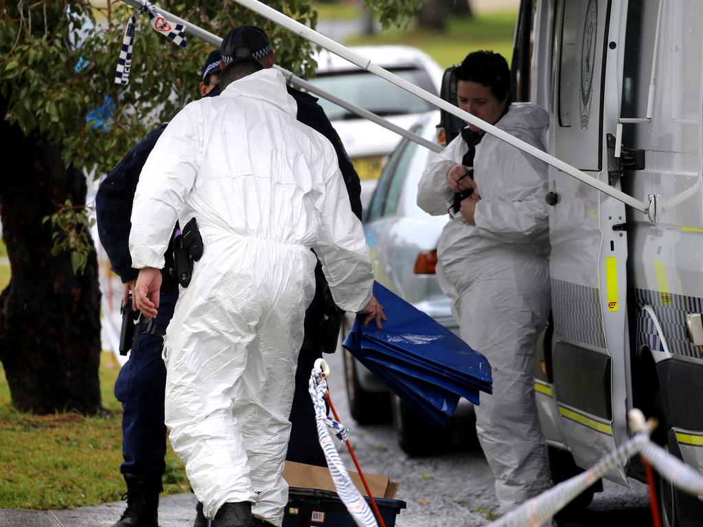 Police at the scene of the killing in Lorking St, Bellambi, near Wollongong. Picture: John Grainger