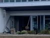 NAMED: Man charged after allegedly crashing ute into building near airport
