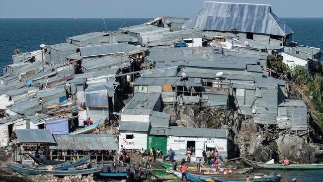 A picture taken on October 5, 2018, shows a general view of Migingo island which is densely populated by residents fishing mainly for Nile perch in Lake Victoria. Picture: Yasuyoshi Chiba / AFP