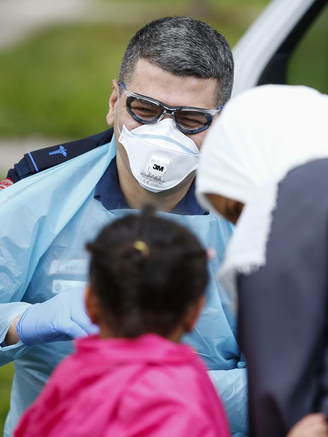 Paramedics perform COVID19 tests in Broadmeadows in Victoria. Picture: AAP Image/Daniel Pockett