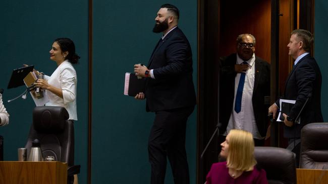 Labor MLA Mark Turner (centre) enters Parliament on Tuesday with fellow Labor colleagues.