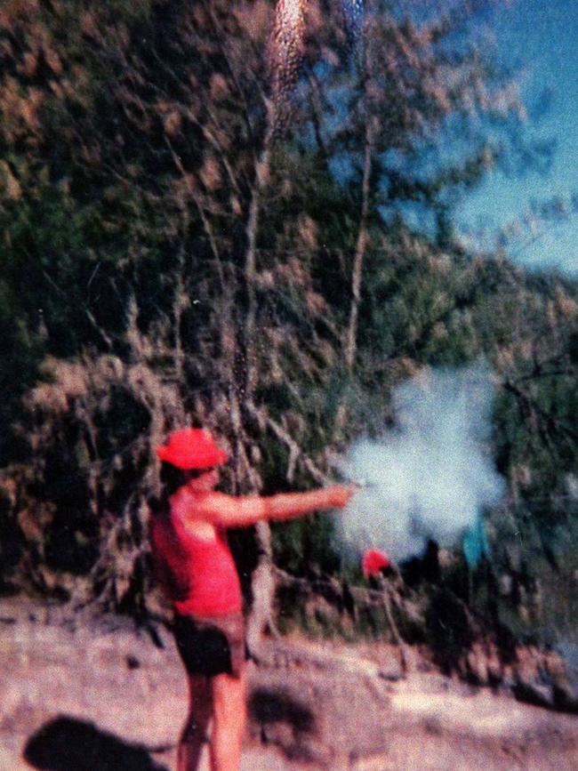 Milat target shooting in 1986 on a family camping trip.