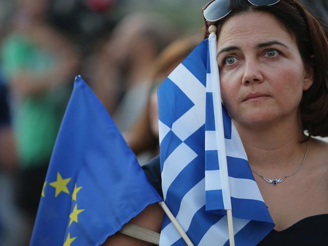 ATHENS, GREECE - JULY 09: Pro-european greeks converge on Syntagma Square to show their support for the euro on July 9, 2015 in Athens, Greece. The Greek government has only hours left to offer Eurozone creditors a viable plan to recovery. Greece's creditors will review the measures before European leaders meet on Sunday to decide on the country's fate and whether it should stay in the euro. (Photo by Christopher Furlong/Getty Images)