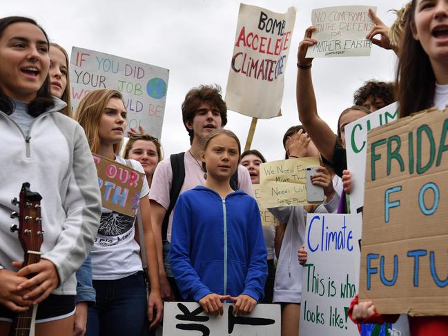 The kids aren’t alright. Swedish environment activist Greta Thunberg (C), 16, takes part in a climate protest outside the White House in Washington. Picture: Nicholas Kamm/AFP